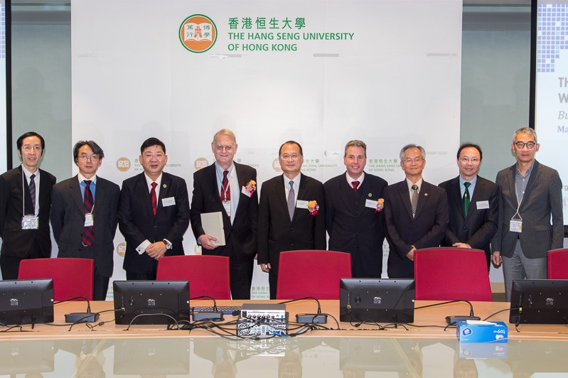 (left to right) Dr Felix TANG (HSUHK), Professor Minghua Liu (UM), President Ho, Professor Snell, Dr Choi, Professor Barnes, Professor Jacky So (UM), Dr Tom Fong (HSUHK) and Dr Ludwig Chang (HKBU)