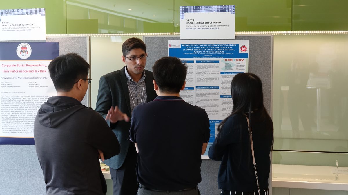 A PhD student presenting his research