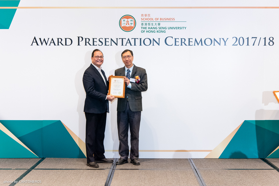 Dr Haksin Chan, Head of Department of Marketing (right), presented the award to Dr Lawrence Lo.